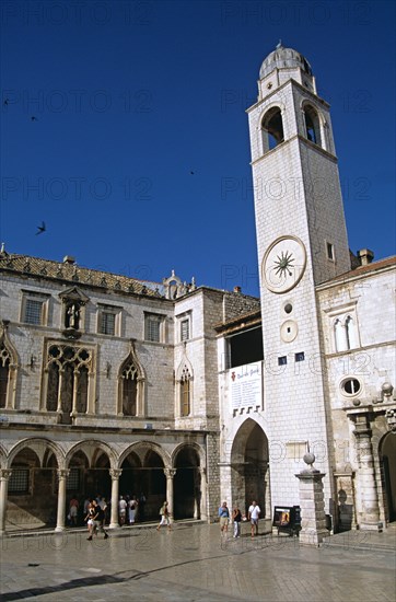 CROATIA, Dalmatian Coast, Dubrovnik, "Bell tower and Sponza Palace, Luza Square, Stradun. Former Yugoslavia"