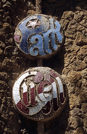 SPAIN, Catalonia, Barcelona, Guell Park sign on building at entrance to Park Guell