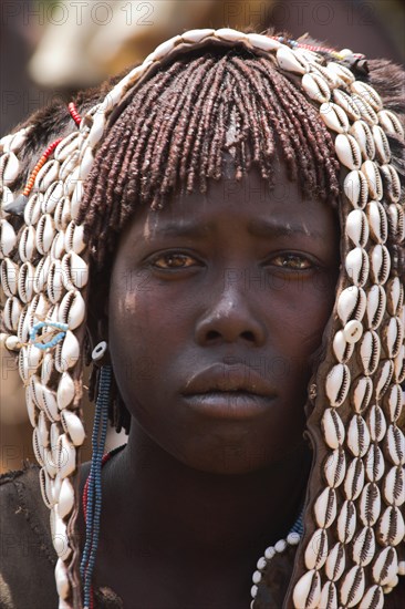 ETHIOPIA, Lower Omo Valley, Key Afir, Banna woman at weekly market