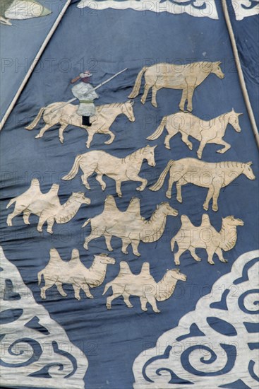 MONGOLIA, Ulan Bator, "Detail of ancient silk tapestry depicting man on horseback herding camels and horses, in Ulan Bator Museum.. Ulaanbaatar East Asia Asian Baator Equestrian Male Men Guy Mongol Uls Mongolian Ulaan  "