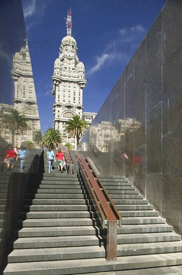 URUGUAY, Montevideo, Steps rising up from Jose G Artigas' mausoleum in Plaza Independencia with Palacio Salvo behind.