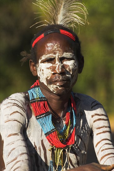 ETHIOPIA, Lower Omo Valley, Mago National Park, Karo man with face painting