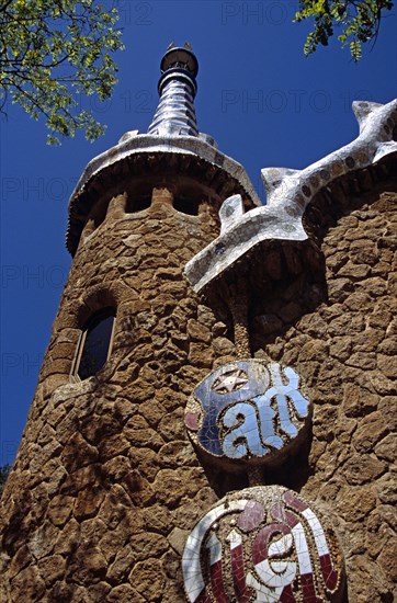 SPAIN, Catalonia, Barcelona, Guell Park sign on building at entrance to Park Guell