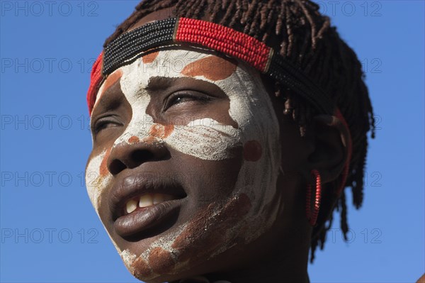 ETHIOPIA, Lower Omo Valley, Mago National Park, Karo woman with face painting.