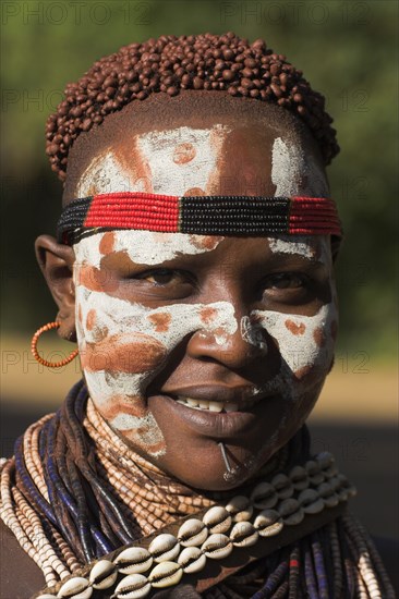 ETHIOPIA, Lower Omo Valley, Mago National Park, Karo woman with face painting.