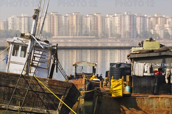 INDIA, Mahararastra, Mumbai, Apartment blocks along the water's edge in South Mumbai.