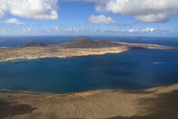 SPAIN, Canary  Islands, Lanzarote, "Mirador del Rio viewpoint, 497 metres or 1630 feet above sea level with view across the Rio Strait towards La Graciosa.  Location created by Cesar Manrique in 1973."