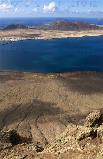 SPAIN, Canary  Islands, Lanzarote, Mirador del Rio viewpoint 497 metres or 1630 feet above sea level lwith view across the Rio strait towards La Graciosa. Location created by Cesar Manrique in 1973.