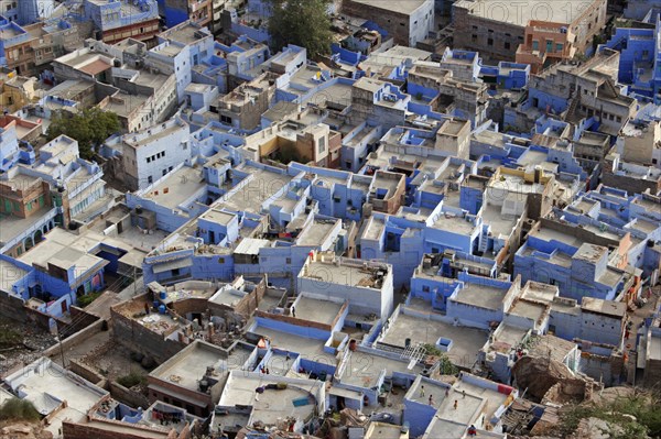 INDIA, Rajasthan, Jodhpur, "Aerial view over flat rooftops of the blue painted houses of the Brahman neighbourhood from Meherangarh Fort, known as the Blue City. "