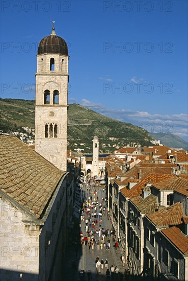 CROATIA, Dalmatian Coast, Dubrovnik, "Franciscan Monastery, Stradun, bell tower at end of Stradun, red rooftops. Former Yugoslavia"