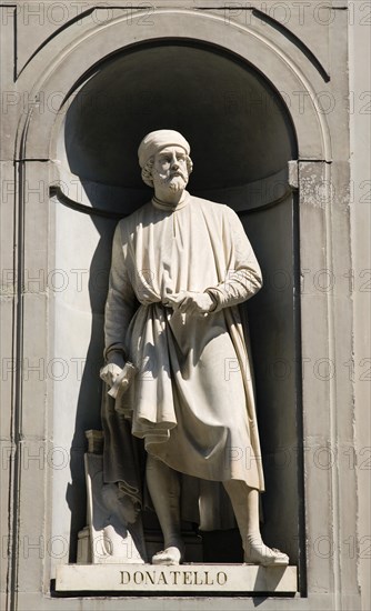 ITALY, Tuscany, Florence, Statue of the sculptor Donatello in the Vasari Corridor outside the Uffizi