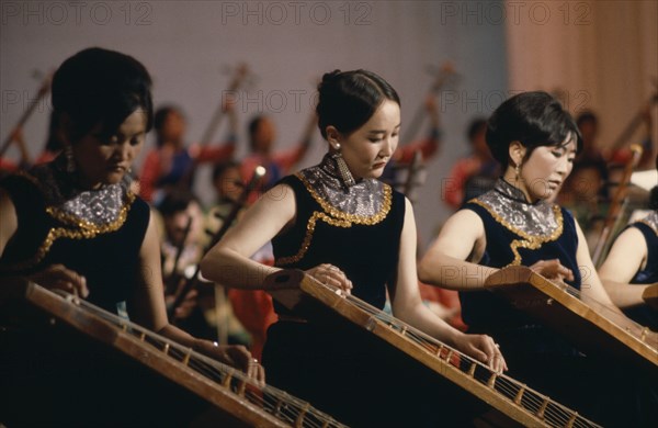 MONGOLIA, Music, Altai Provincial Orchestra musicians playing Mongolian national music on traditional stringed instruments. East Asia Asian Mongol Uls