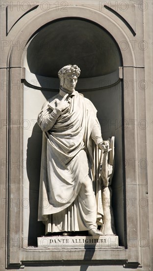 ITALY, Tuscany, Florence, Statue of the poet and writer Dante Allighieri in the Vasari Corridor outside the Uffizi