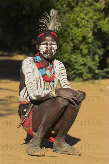 ETHIOPIA, Lower Omo Valley, Mago National Park, Karo man with face painting