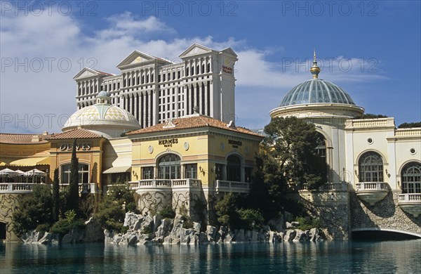 USA, Nevada, Las Vegas, "Caesars Palace Hotel and Casino, across lake in front of the Bellagio."