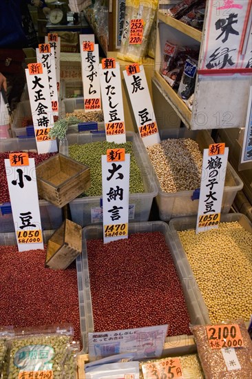 JAPAN, Honshu, Tokyo, Tsukiji market.   Labelled boxes of seeds and pulses for sale at at the worlds biggest fish and food market known as ‘the stomach of Tokyo’.