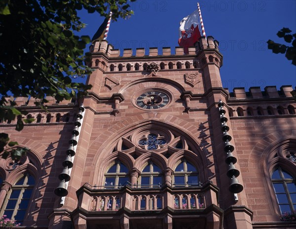 GERMANY, Baden Wurttemberg , Tauberbischofsheim, Rathaus or Town Hall exterior with carillon bells and flag fyling from roof