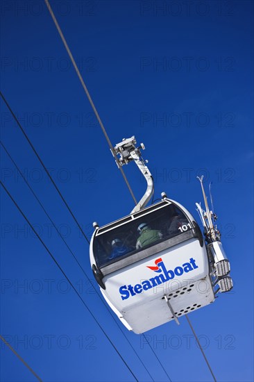 20091046 View cable car againts bright blue sky. American Automobile Automotive Cars Motorcar North America United States America  Dominant BlueTRAVEL BrochureTravelTransportRegion - North America Jon Hicks 20091046 USA Colorado Steamboat Springs