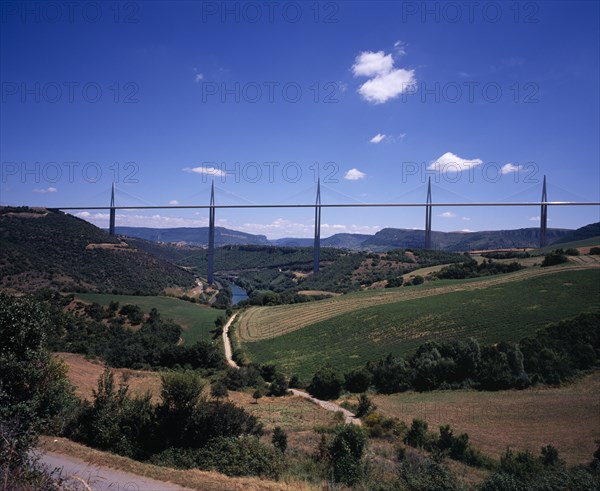 FRANCE, Midi-Pyrenees, Aveyron, Millau bridge which spans the Tarn River Valley and carries the A75 motorway from Beziers to Clermont Ferrand.  Seen from the west.