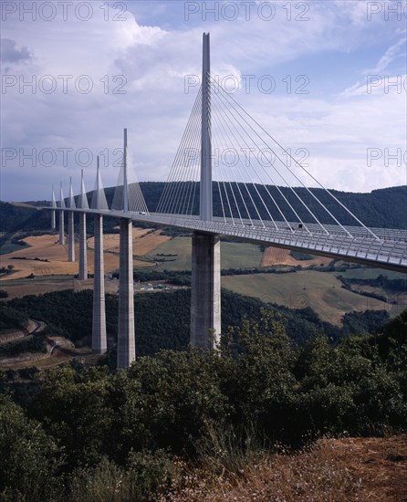 FRANCE, Midi Pyrenees, Aveyron, North end of the Millau bridge crossing the Tarn Valley carrying the A75 motorway linking Beziers in the south with Clermont Ferrand in the north.