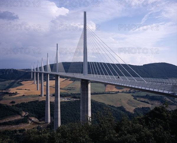 FRANCE, Midi Pyrenees, Aveyron, North end of the Millau bridge crossing the Tarn Valley carrying the A75 motorway linking Beziers in the south with Clermont Ferrand in the north.