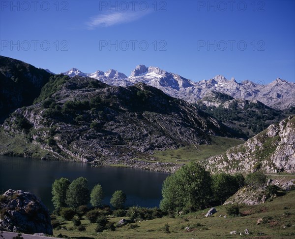 SPAIN, Asturias, Picos de Europa, Cornian mountain group also known as the Western Massif.  View from north over Lago Enol