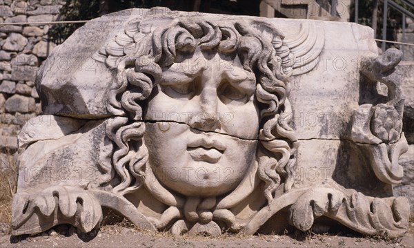 TURKEY, Altinkum, Didyma, Temple of Apollo. Carved head of Medusa.