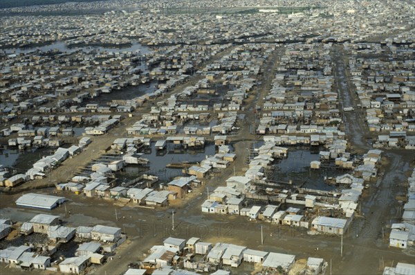 ECUADOR, Guayas Province, Guayaquil , Aerial view over slum housing