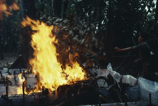 COLOMBIA, , The army burning and destroying a jungle cocaine laboratory in the war against illegal drugs