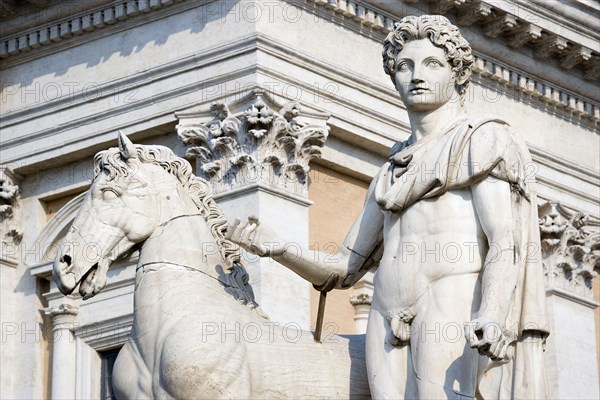ITALY, Lazio, Rome, One of the restored classical statues of the Dioscuri Castor and Pollux at the top of the Cordonata on the Capitoline