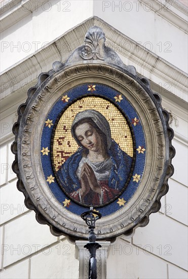 ITALY, Lazio, Rome, 18th Century mosaic of the Madonna on the corner of a building in the Campo de Fiori the open air market
