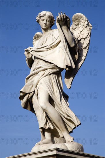 ITALY, Lazio, Rome, Statue of a winged female angel on the Ponte Sant Angelo bridge over the River Tiber