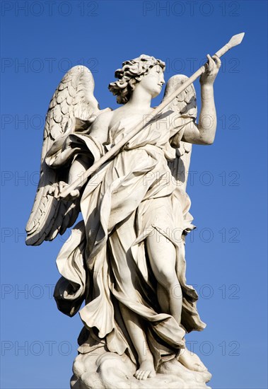 ITALY, Lazio, Rome, Statue of a winged female angel on the Ponte Sant Angelo bridge over the River Tiber