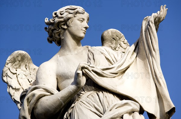 ITALY, Lazio, Rome, Statue of a winged female angel on the Ponte Sant Angelo bridge over the River Tiber