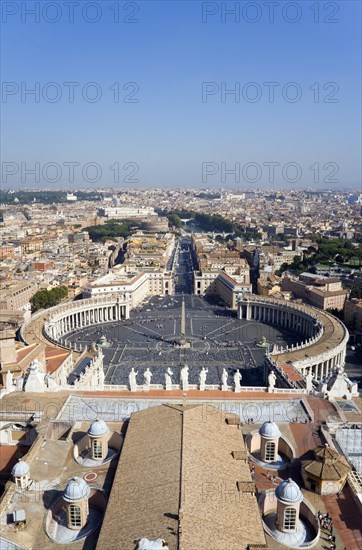 ITALY, Lazio, Rome, Vatican City View from the Dome of the Basilica of St peter across the Piazza San Pietro circled by Bernini colonnade towards Castel Sant Angelo and the River Tiber