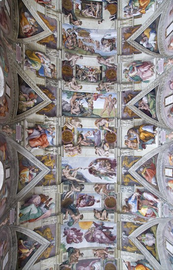 ITALY, Lazio, Rome, Vatican City The Sistine Chapel ceiling fresco by Michelangelo for Pope Julius II between 1508 and 1512. The main central panels depict the Creation of The World and the Fall of Man surrounded by subjects from the Old Testament