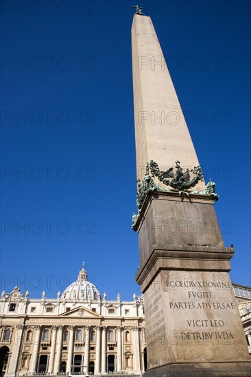 ITALY, Lazio, Rome, Vatican City The facade of the Basilica of Saint Peter with the obelisk in the foreground in Piazza San Pietro