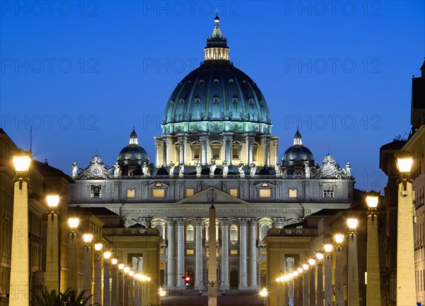 ITALY, Lazio, Rome, Vatican City The Basilica of St Peter and the Via della Conciliazione illuminated at night