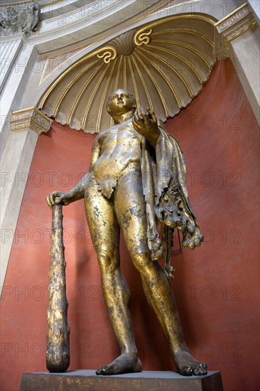ITALY, Lazio, Rome, Vatican City Museum The bronze gilded cult statue of Hercules of the Theatre of Pompey in the Sala Rotonda of the 15th Century Belvedere Palace of Pope Innocent VIII