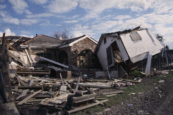 USA, Louisiana, New Orleans, "Aftermath of 2005 Hurricane Katrina, rubble from destroyed houses and building lifted off its foundations."