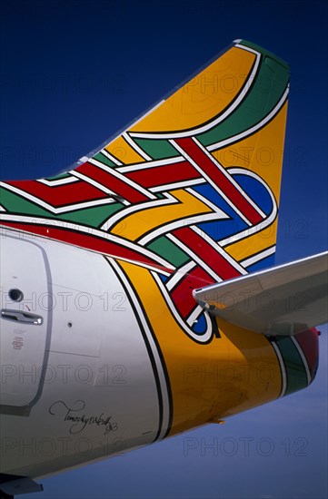 TRANSPORT, Air, Plane Detail, Boeing 737 at Gatwick Airport operated by British Airways. Detail of tail design by artist Tim O’Neil from Dublin Ireland entitled Colum meaning Dove in Irish