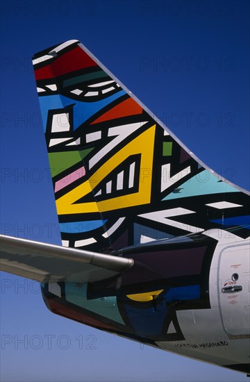 TRANSPORT, Air, Plane Detail, Boeing 737 at Gatwick Airport operated by British Airways. Detail of tail design by artists Emmly and Martha Masanabo from South Africa entitled Ndebele
