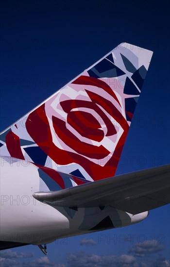 TRANSPORT, Air, Plane Detail, Boeing 767-336ER at Gatwick Airport operated by British Airways. Detail of tail design by artist Pierce Casey from the United Kingdom entitled Chelsea Rose
