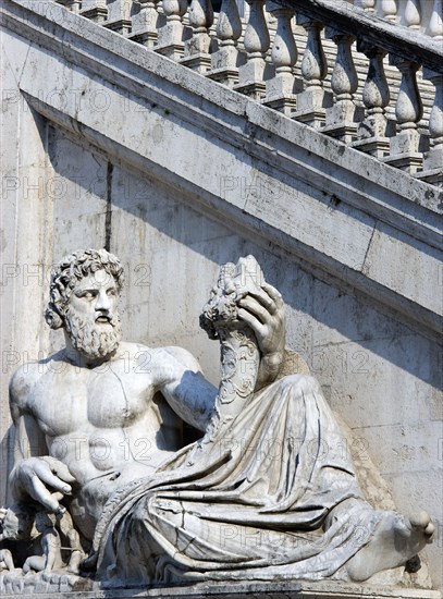 ITALY, Lazio, Rome, Palazzo Senatorio on the Capitol with a staircase by Michelangelo and a statue representing the River Tiber from Hadrian's baths on the Quirinal