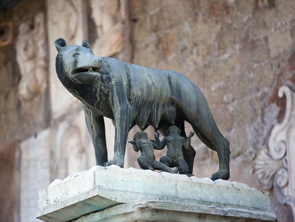 ITALY, Lazio, Rome, Bronze statue of Romulus and Remus feeding from the she wolf beside the Palazzo Senatorio on the Capitol