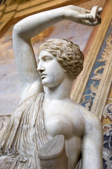 ITALY, Lazio, Rome, Vatican City Museum Marble statue of a semi naked woman with one arm raised in the Room of The Busts of the Belvedere Palace