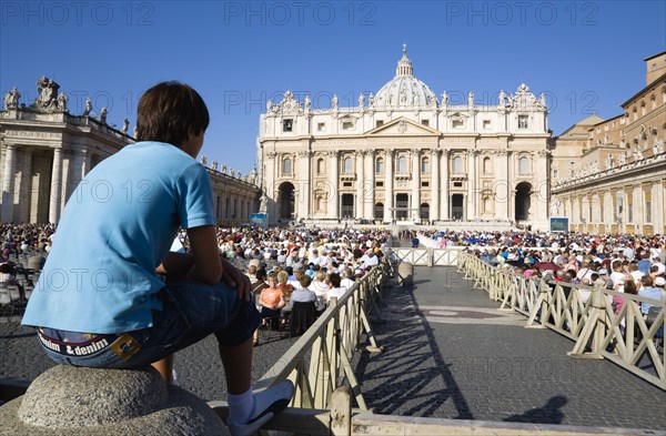 ITALY, Lazio, Rome, Vatican City Pilgrims seated in St Peter's Square for the wednesday Papal Audience in front of the Basilica