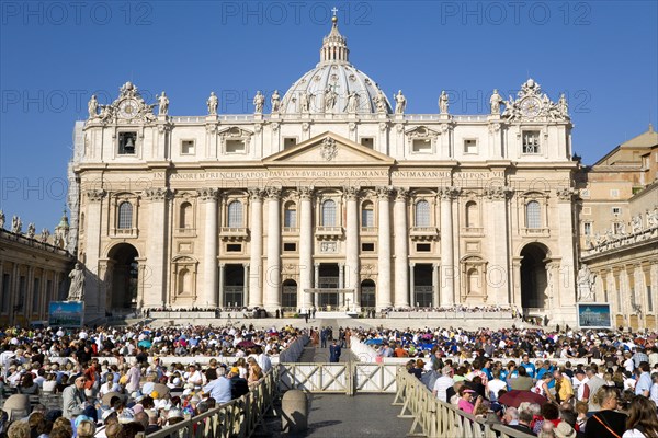 ITALY, Lazio, Rome, Vatican City Pilgrims seated in St Peter's Square for the wednesday Papal Audience in front of the Basilica