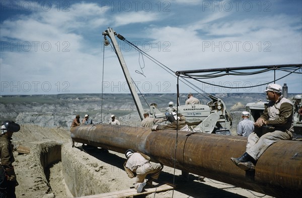 CANADA, Saskatchewan , Prairies, Constructing Trans Canada gas pipeline over Saskatchewan Prairies. 34inch front end join.