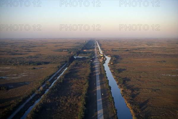 USA, Florida, Everglades, Aerial view over drainage canal and highway